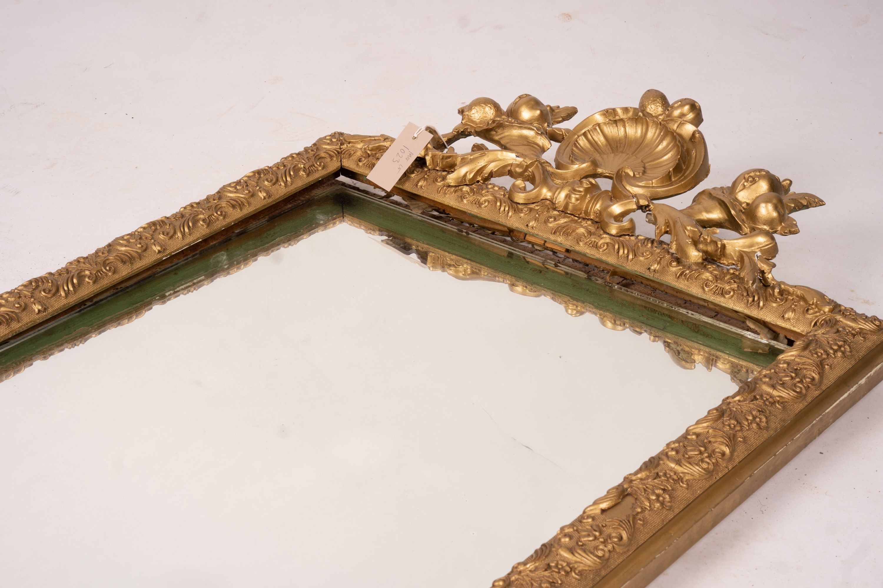 A 19th century French gilt gesso wall mirror, width 64cm, height 116cm together with a modern larger rectangular wall mirror